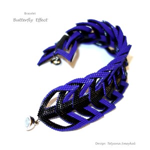 May include: A purple and black beaded bracelet with a butterfly effect design. The bracelet is made with small, intricate beads and has a unique, geometric pattern.