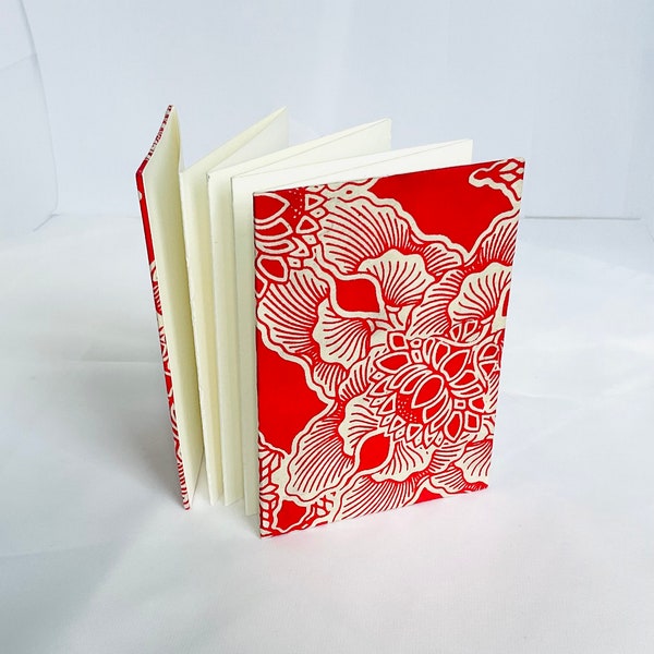 A7 Concertina Sketch pad made with 250GSM Fabriano Unica White Paper, Covered with Red Lotus Lokta Paper, 14 Pages.