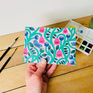A6 Watercolour Sketchbook with whimsical bird design, Coptic bound sketchpad with 300 gsm watercolour paper.