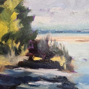 May include: A painting of a seascape with a green grassy hill in the foreground, a rocky shoreline, and a blue body of water in the background. The sky is a light blue with white clouds.