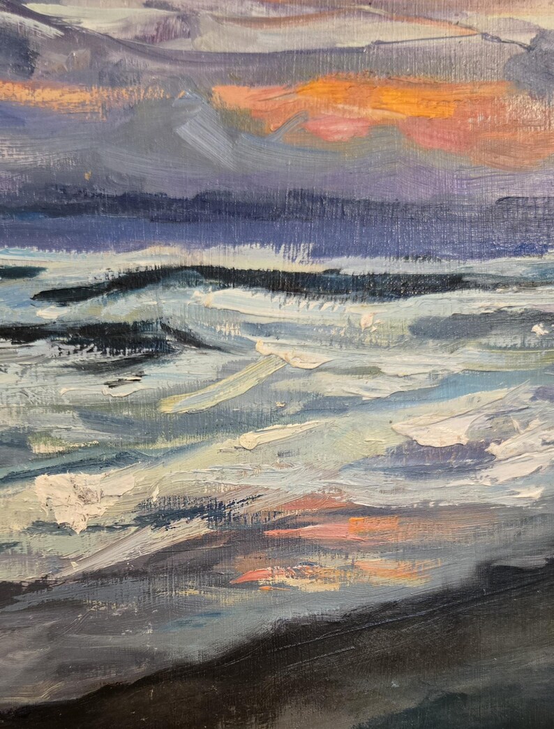 May include: An oil painting depicting a seascape at sunset. The sky features hues of orange, pink, and purple, with dark blue clouds. The water is a mix of blues and whites, with visible brushstrokes creating a textured effect.