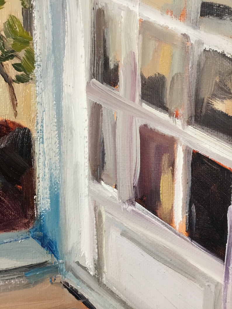 May include: A close-up of a white painted window with a blue painted frame. The window is open and the glass panes are visible. The paint is textured and has a brushstroke effect.