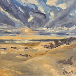 May include: An oil painting on canvas depicting a coastal landscape with a sandy beach in the foreground, a dark blue ocean horizon, and a dramatic sky filled with thick, textured clouds in shades of blue, grey, and white. The name Bignell is signed.