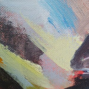 May include: Abstract painting with strokes of blue, yellow, green, pink, and black paint on a textured canvas.