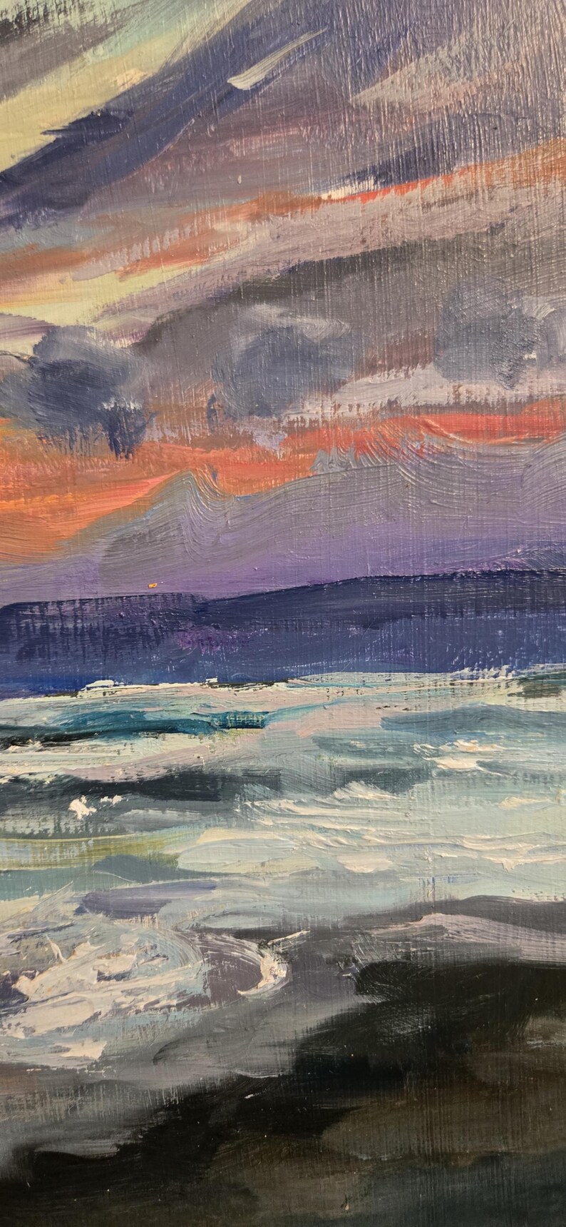May include: Oil painting of a seascape with a vibrant sunset. The sky transitions from orange to purple, with dark clouds above a dark blue horizon line. The water is a mix of blues and whites, with visible brushstrokes.