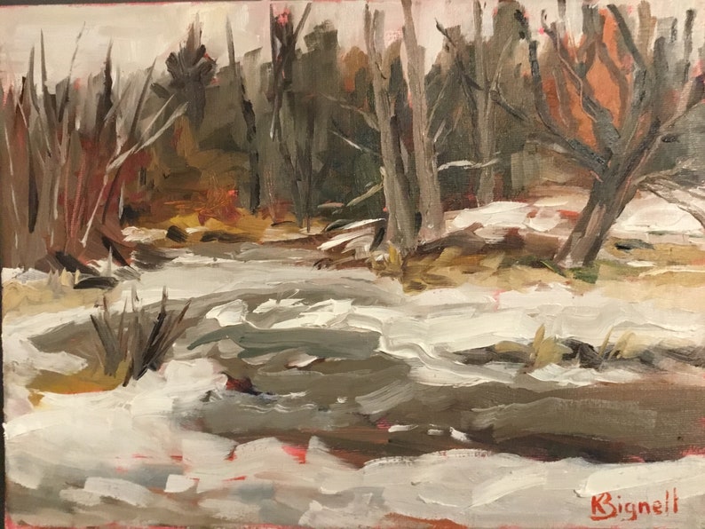 May include: A painting of a snowy winter scene with a stream running through a forest. The trees are bare and the ground is covered in white snow. The stream is partially frozen over and the water is a dark gray color. The artist's signature, "K. Bignell", is visible in the lower right corner of the painting.
