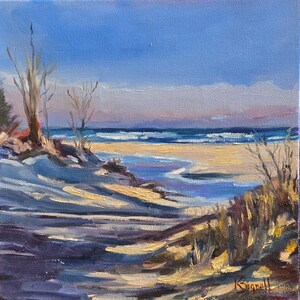 May include: A painting of a beach scene with blue water, yellow sand, and a small stream running through the sand. The sky is a light blue with a few clouds. There are some trees and bushes in the foreground.
