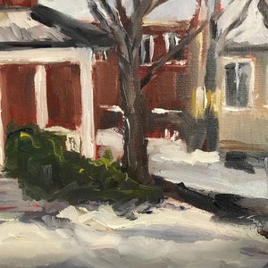 May include: A painting of a brick house with a white porch and a snow-covered yard. There are two bare trees in the foreground.
