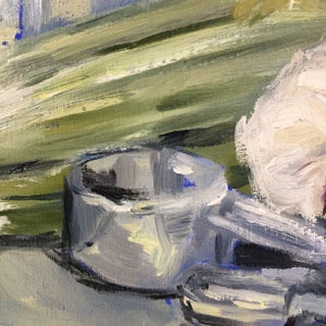 May include: Oil painting of a still life featuring a silver metal cup and a white flower. The background has green and yellow brushstrokes. The painting has a textured, impressionistic style.