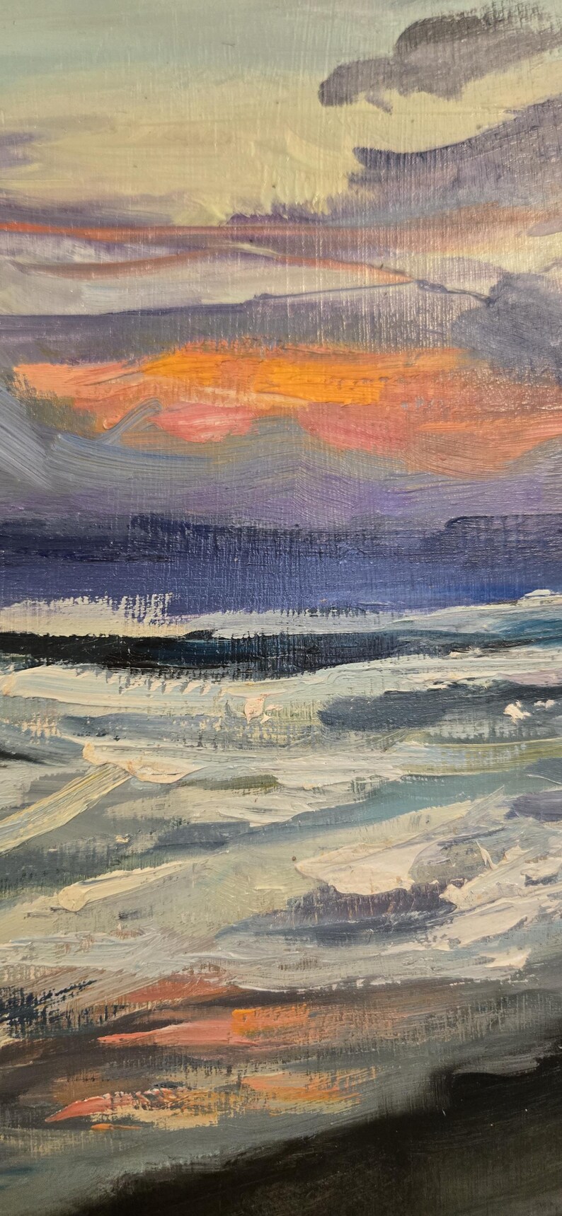 May include: Oil painting of a seascape with a vibrant sunset. The sky transitions from light blue to orange and pink, with dark clouds. The ocean is depicted with white and blue brushstrokes.