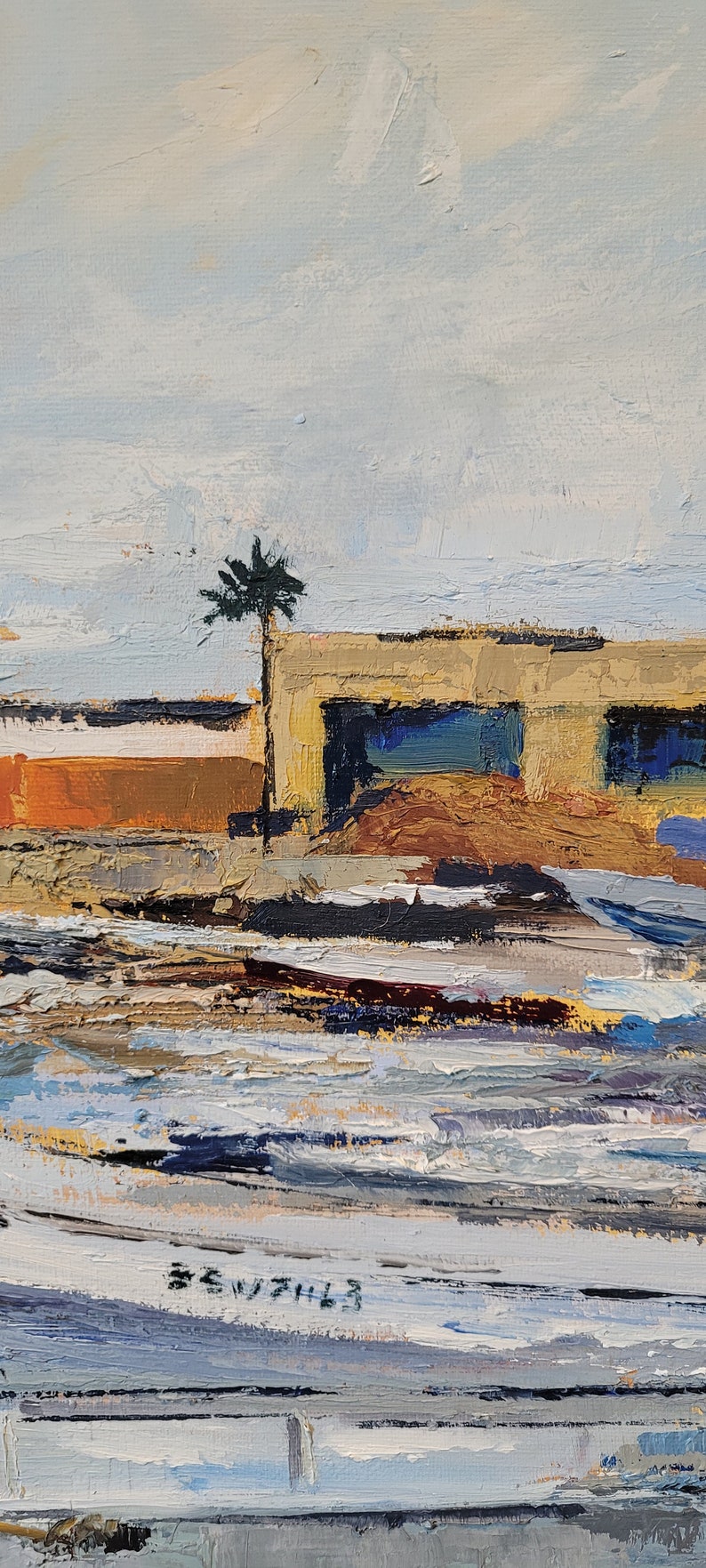 May include: Impressionistic oil painting of a building with a palm tree. The building has a tan facade with blue windows and an orange section. The sky is light blue, and the foreground is a textured mix of colors.