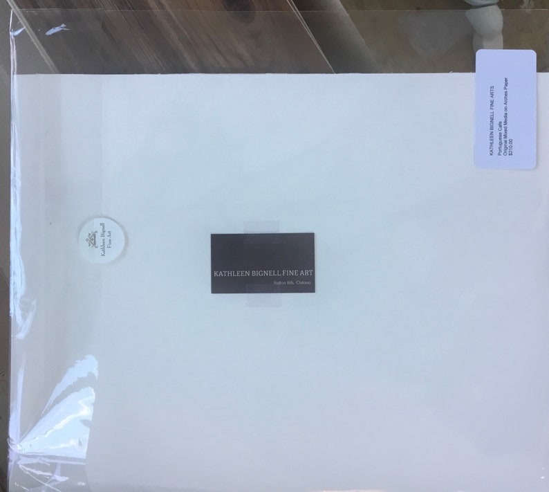 May include: A white card with the text "KATHLEEN BIGNELL FINE ART" printed in black. The card is on a white background.