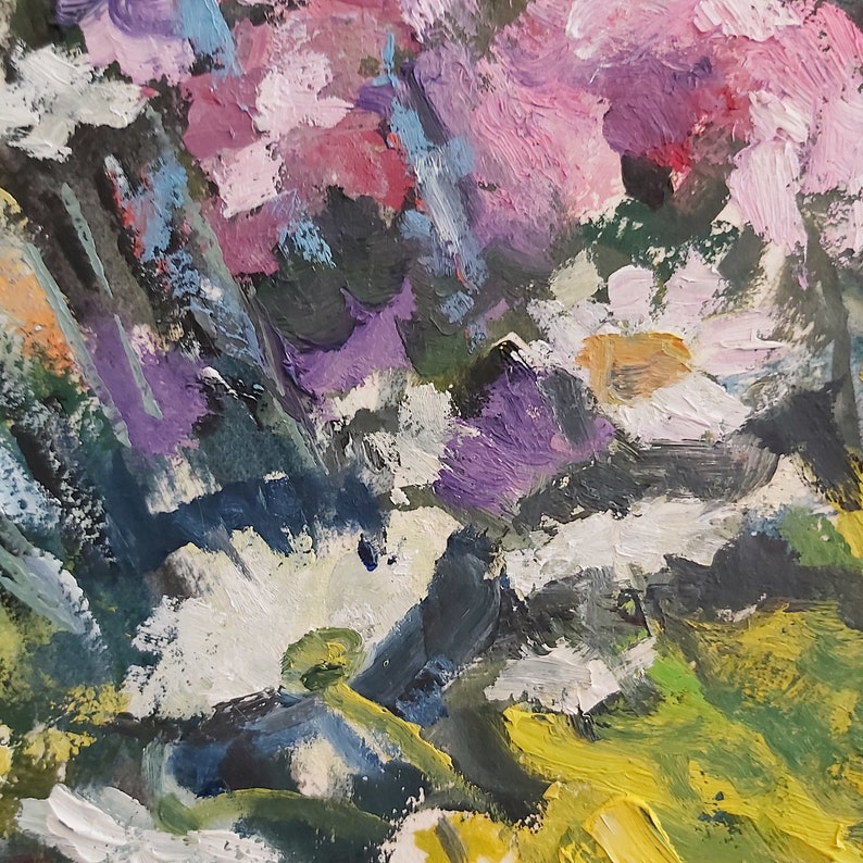 May include: Abstract painting with a mix of purple, pink, white, yellow, and green paint. The paint is applied in thick strokes, creating a textured surface.