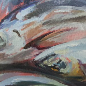 May include: Close-up of a painting of fish with blue, gray, and brown tones. The fish are painted with thick brushstrokes and have visible scales. The painting is abstract and impressionistic.