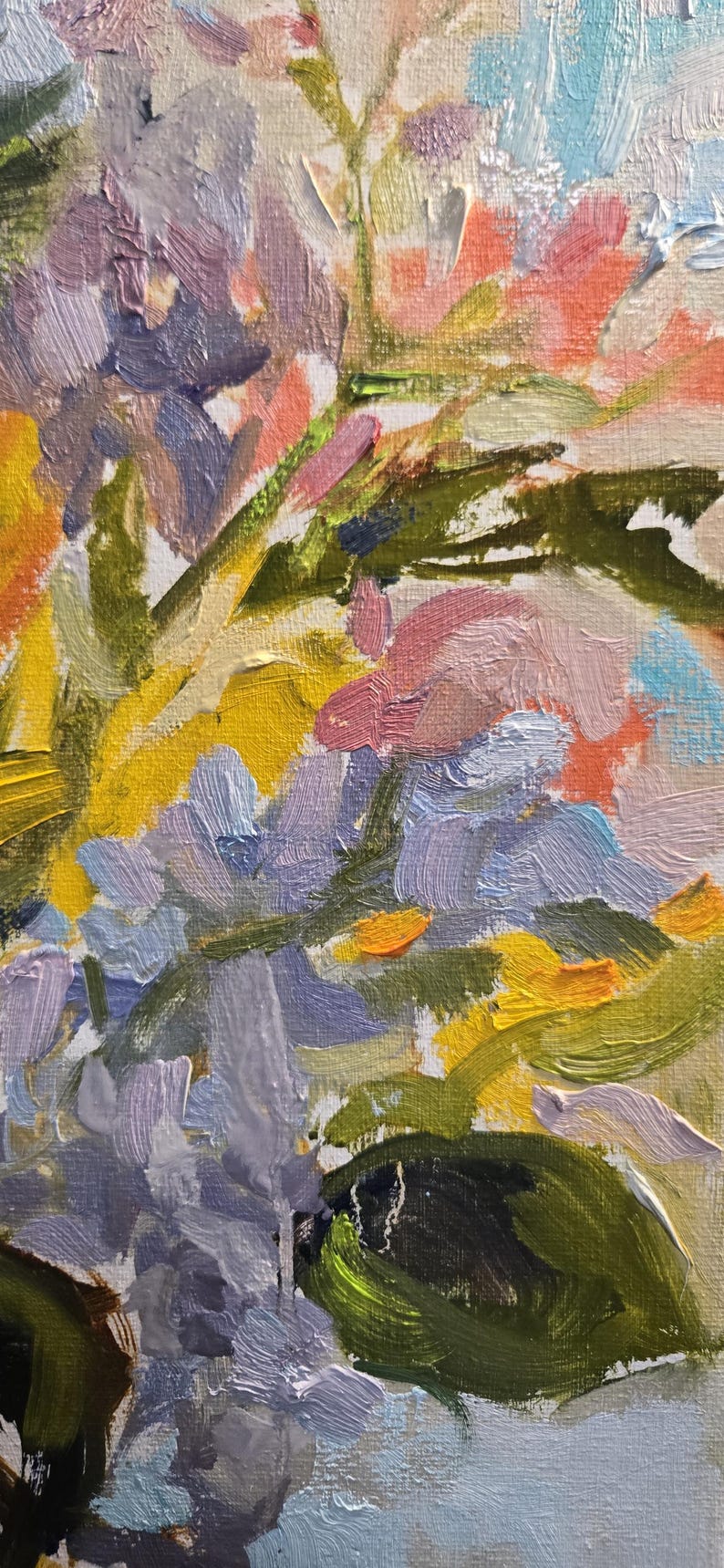 May include: Close-up of an impressionistic oil painting of flowers. The artwork features a vibrant mix of colors, including yellow, pink, purple, and green, applied with visible brushstrokes. The painting evokes a sense of natural beauty and texture.