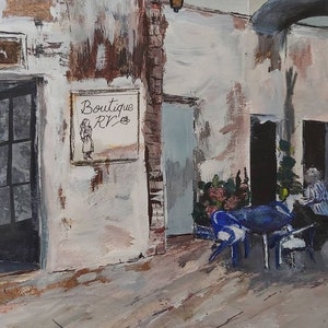 May include: A painting of a storefront with a sign that reads "Boutique RVZ". There is a table and chairs outside the store, and a person sitting at the table.