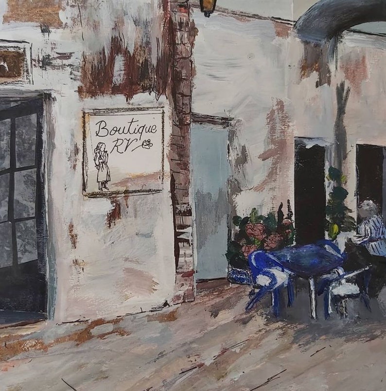 May include: A painting of a storefront with a sign that reads "Boutique RVZ". There is a table and chairs outside the store, and a person sitting at the table.