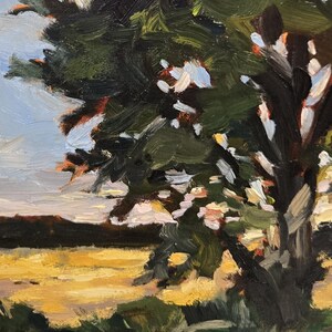 May include: Oil painting depicting a tree with dark green foliage and a thick, dark trunk. The background shows a yellow field and a light blue sky. The artwork has visible brushstrokes and a textured appearance.