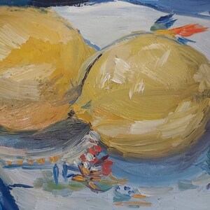 May include: Two yellow lemons on a blue and white patterned surface. The lemons are painted in a loose, impressionistic style with visible brushstrokes.