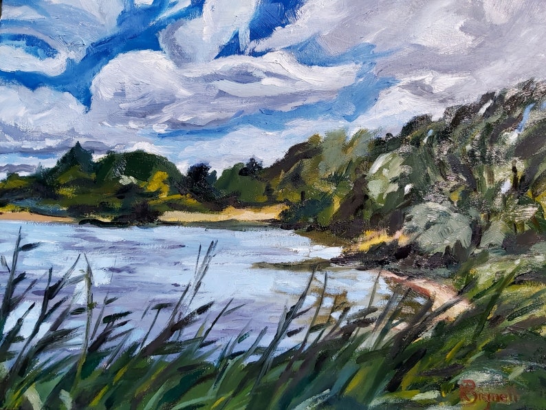 May include: An oil painting depicts a serene landscape with a body of water, likely a lake or river, under a cloudy sky. Lush green trees line the shore, and tall grass sways in the foreground. The artwork uses a palette of blues, greens, and whites.