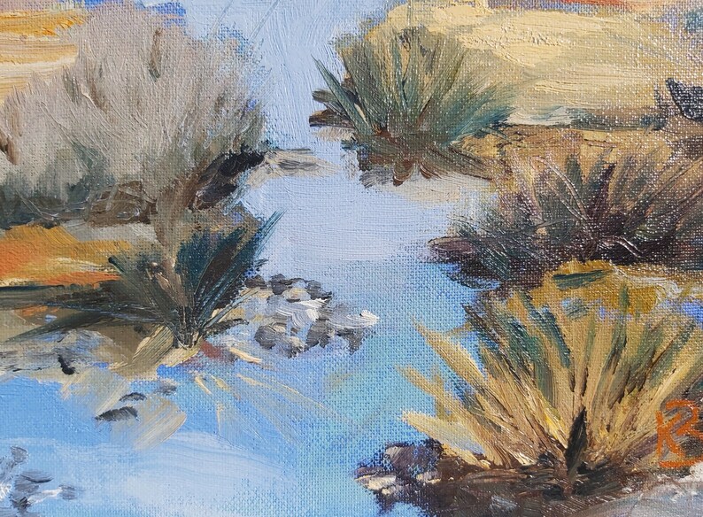 May include: A painting of a blue sky with brushstrokes of white and yellow. The sky is reflected in a body of water, and there are green and brown brushstrokes of grass and reeds around the water.