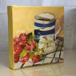 May include: A still life painting of a blue and white striped mug, a bunch of red radishes, and a white flower on a checkered tablecloth.