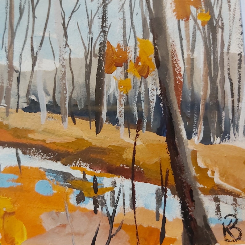 May include: A watercolor painting of a forest scene with a stream running through it. The trees are mostly bare, but some have yellow leaves. The stream is a light blue color and the ground is a light brown color.