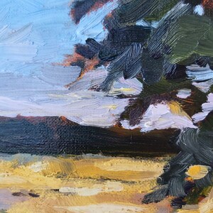 May include: An oil painting of a landscape with an impressionistic style. The artwork shows a sky with blue and white hues, a dark treeline, and a field of yellow and brown. Dark green brushstrokes represent foliage, creating a textured effect.