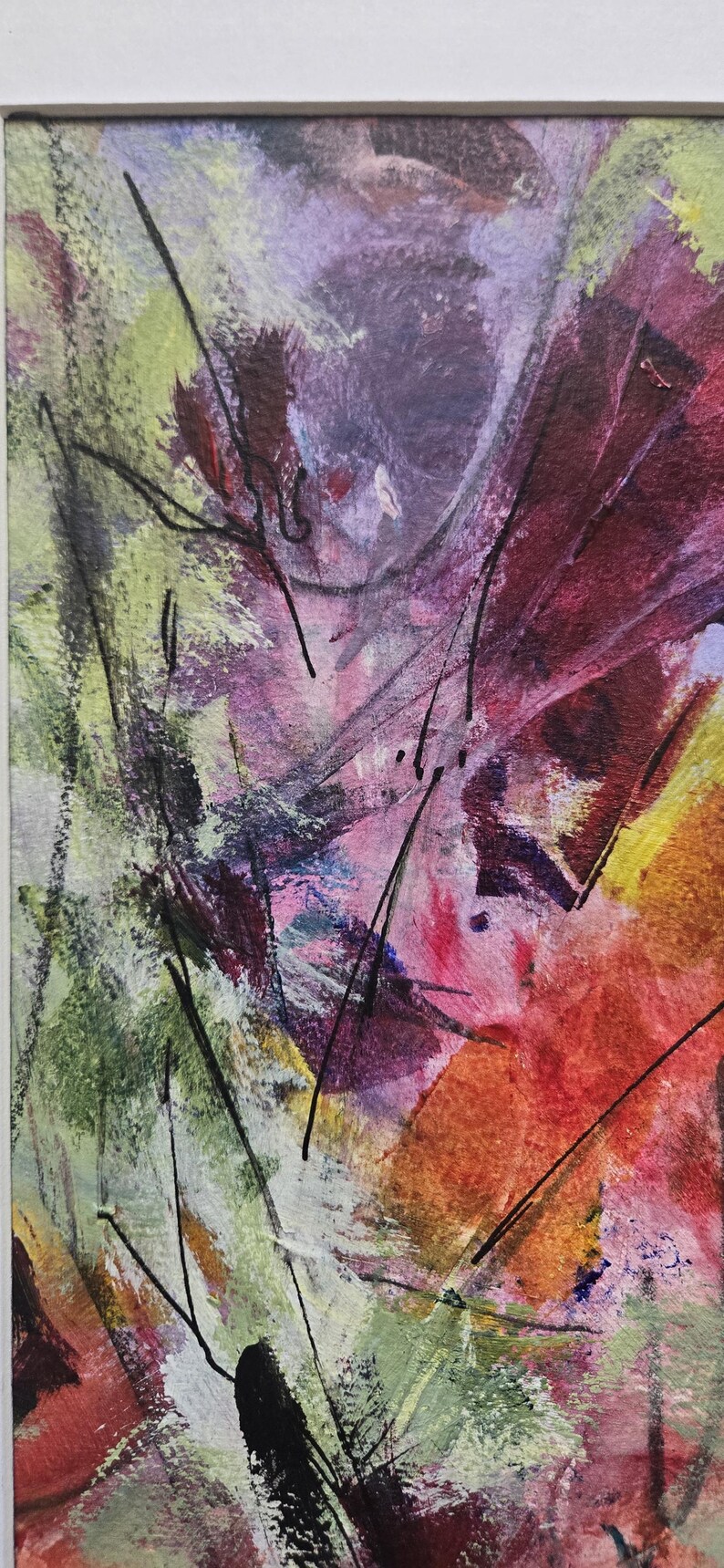 May include: An abstract painting featuring a vibrant mix of purple, orange, green, and red paint strokes. The composition includes thin, sharp black lines layered over the textured, colorful background, all enclosed within a simple white frame.