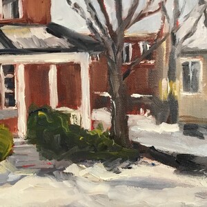 May include: A painting of a red brick house with a white porch and a green bush in front. The house is covered in snow and there are bare trees in the background.