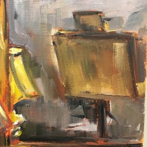 May include: A painting of a still life with a wooden easel, a yellow object, and a brown box. The background is a muted gray.