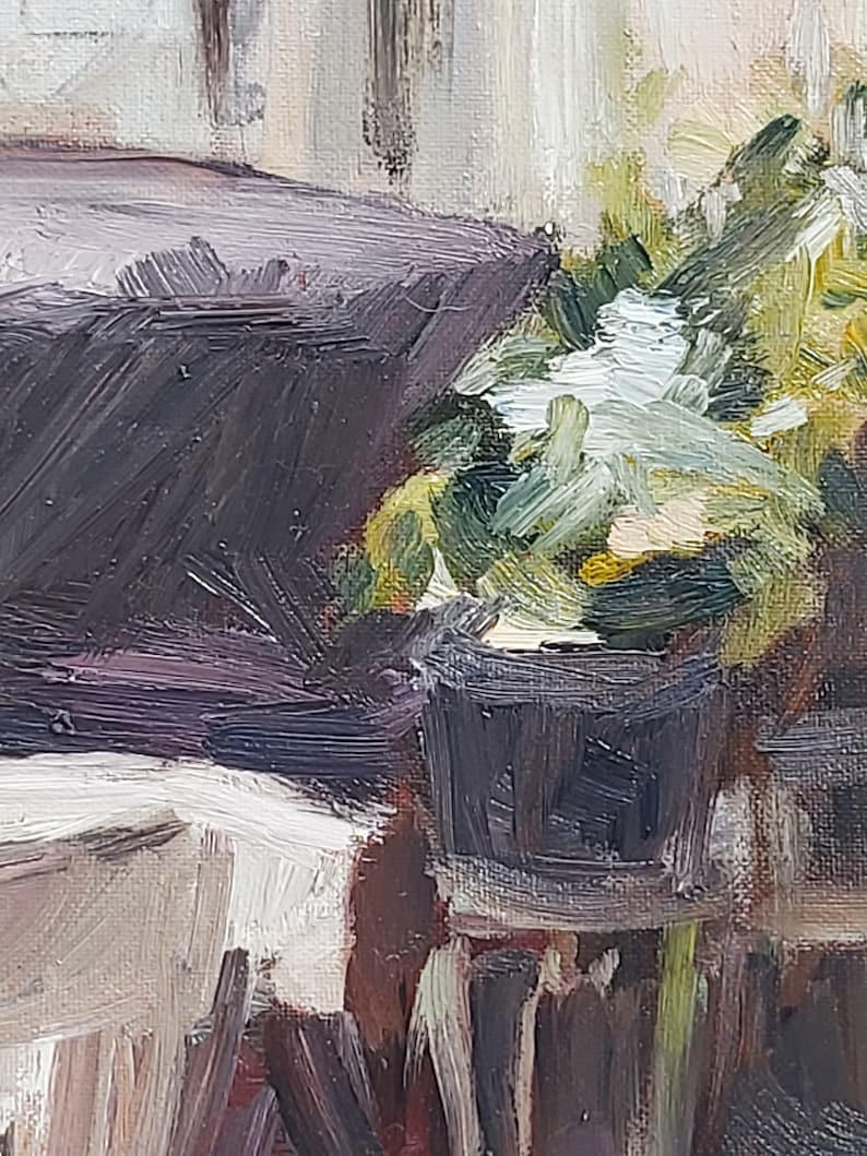 May include: A close-up of a painting depicting a potted plant with green leaves and white flowers. The plant is in a dark brown pot and is sitting on a table. The background is a light brown wall.
