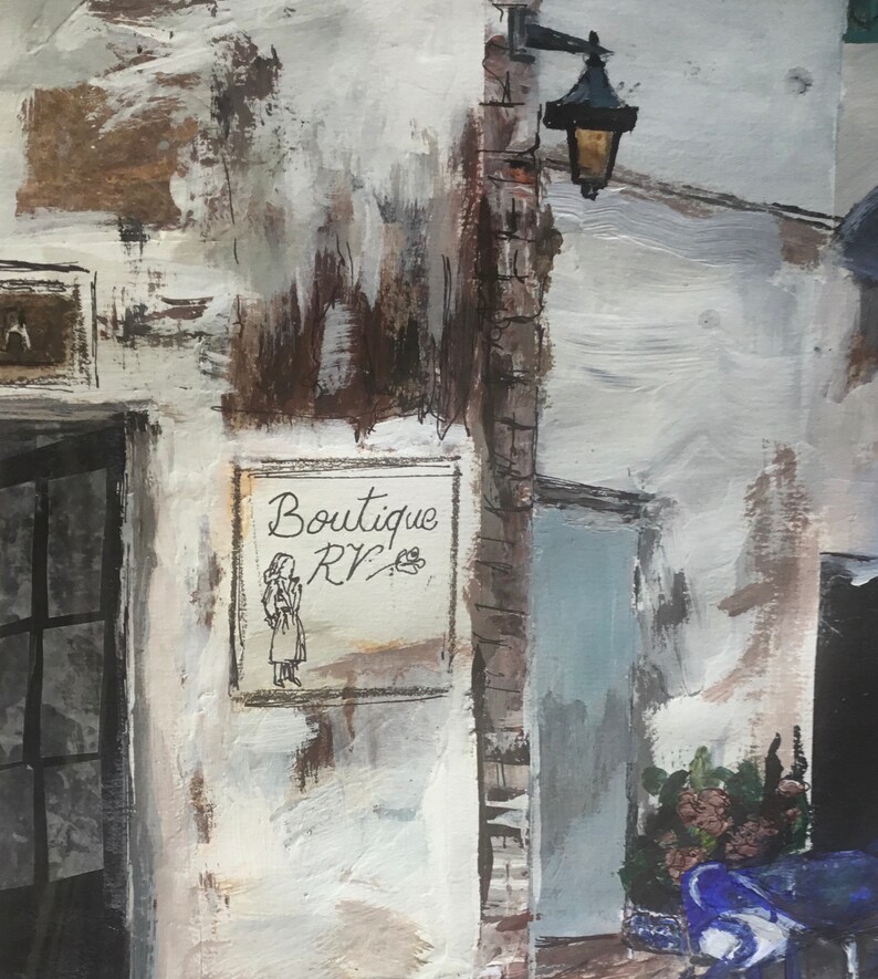 May include: A white building with a sign that reads "Boutique RV". The sign has a drawing of a woman in a dress. There is a street lamp on the side of the building.