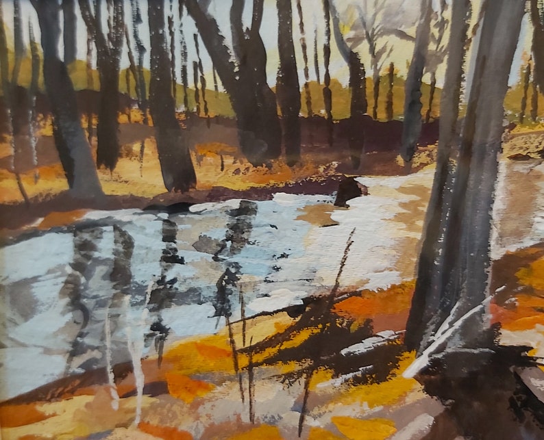 May include: A painting of a forest scene with a stream running through it. The trees are dark and the water is light blue. The ground is covered in fallen leaves.