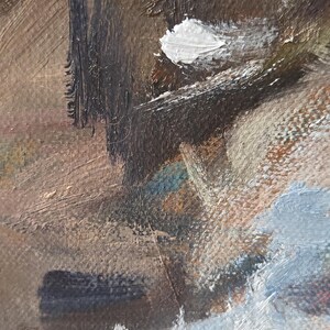 May include: Close-up of an abstract oil painting with textured brushstrokes. The artwork features a palette of browns, whites, and blues, suggesting a landscape or seascape. The style is expressive and impressionistic.