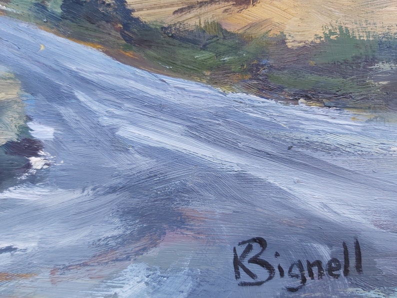 May include: A close-up of a painting with a blue and white abstract design. The artist's signature, "K Bignell", is visible in the bottom right corner.