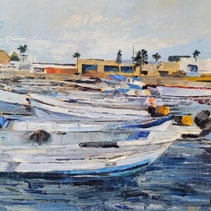 May include: Oil painting of several white fishing boats docked in a harbor. The boats have blue and yellow accents, and are surrounded by blue water. Buildings and palm trees are visible in the background under a cloudy sky.