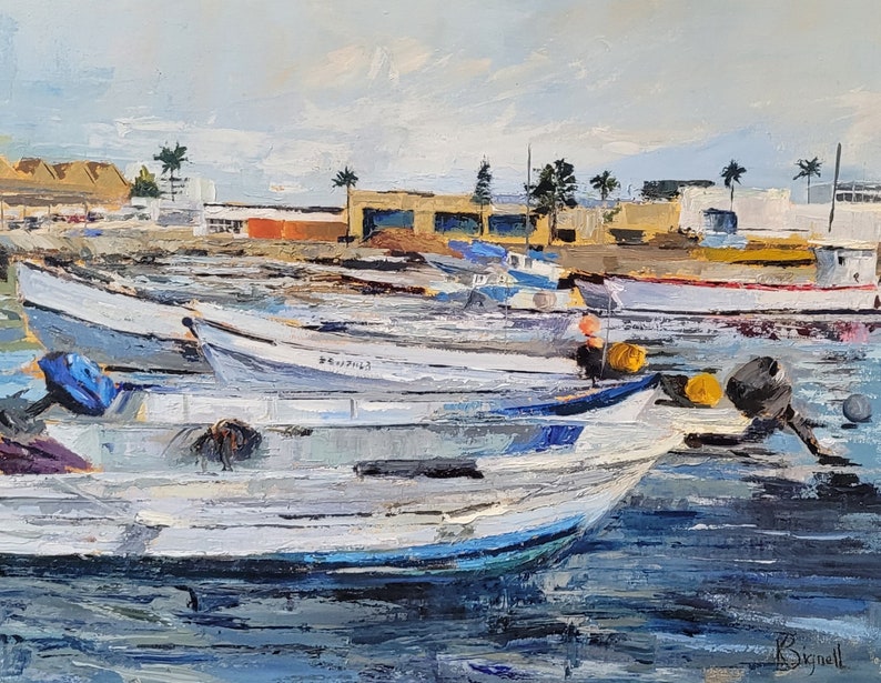 May include: Oil painting of several white fishing boats docked in a harbor. The boats have blue and yellow accents, and are surrounded by blue water. Buildings and palm trees are visible in the background under a cloudy sky.