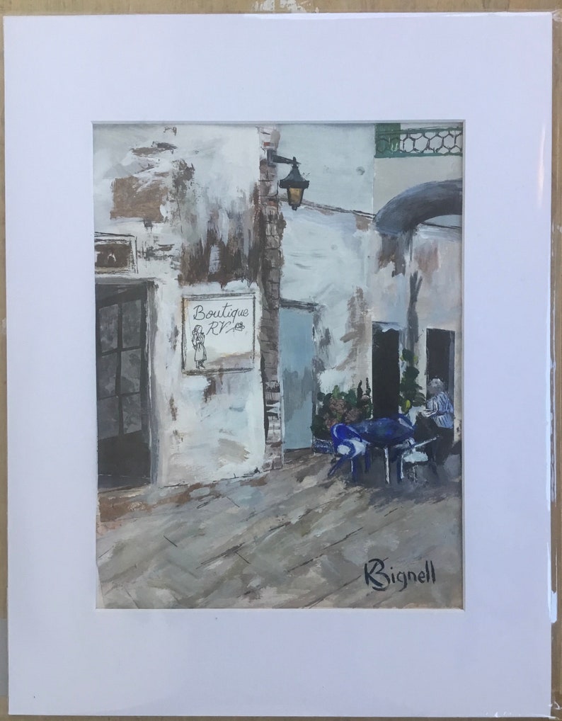 May include: A painting of a street scene with a shop called "Boutique R/Z" and a person sitting at a table outside. The painting is done in a muted color palette with shades of gray, brown, and blue.
