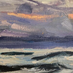 May include: An oil painting depicting a seascape with a dramatic sky. The artwork features a blend of blues, grays, and hints of orange, creating a moody atmosphere. Brushstrokes are visible, adding texture to the scene.