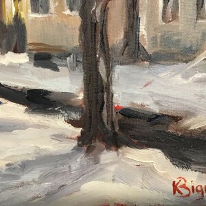 May include: A close-up of a painting depicting a snowy street scene with a tree trunk in the foreground. The artist's signature, "K. Signell", is visible in the lower right corner.