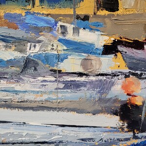 May include: An impressionistic oil painting of a harbor scene. The artwork features boats in shades of blue and white, with yellow and orange buoys. The water is depicted with textured brushstrokes, and the background shows buildings with yellow and brown tones.