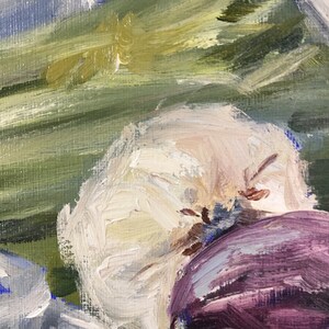 May include: Close-up of an oil painting featuring a still life of white and purple flowers. The brushstrokes are visible, creating a textured effect. Green and blue hues are in the background.