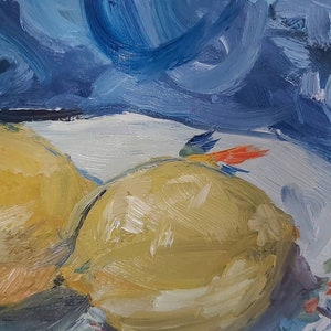 May include: Two yellow lemons on a white surface with a blue and orange background. The lemons are painted in a loose, impressionistic style.