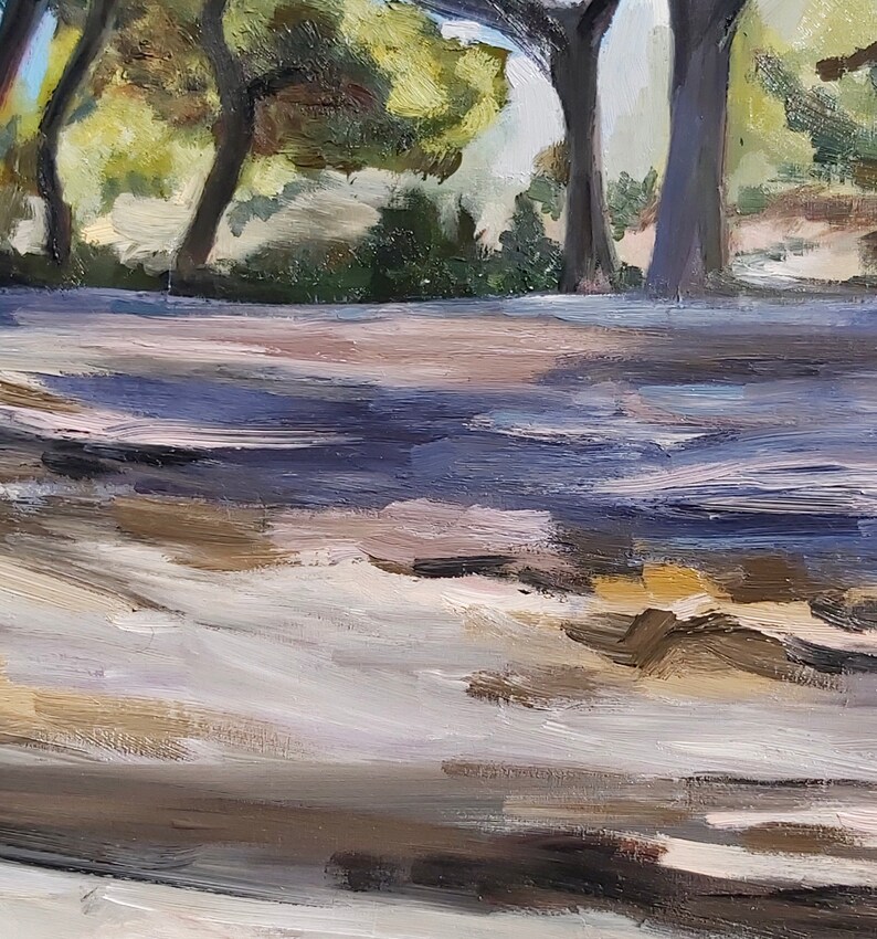 May include: An impressionistic oil painting of a sunlit forest scene. The foreground features a path with long shadows cast by trees. The trees have dark trunks and green foliage, with sunlight filtering through the leaves.