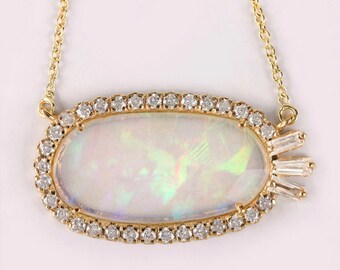 Colgante de ópalo etíope en oro de 14 quilates: joyería de aniversario con diamantes de talla baguette
