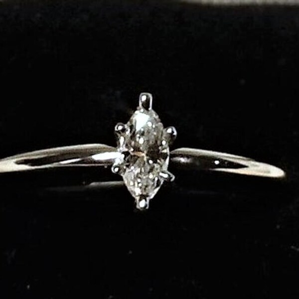 14K White Gold and .21 carat Marquise cut Solitaire Diamond Ring, Size 10