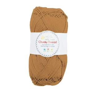 May include: A ball of brown 100% cotton yarn labeled "Chunky Thread by Lori Holt of Bee in My Bonnet".