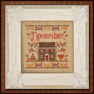 May include: Cross stitch pattern featuring a house with a red door, a rooster, and the word "November" in a brown frame.