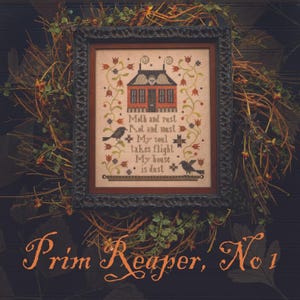 May include: A framed cross-stitch sampler featuring a house with a skull above the door, two black birds, and floral vines. The text reads: Moth and rust, Rot and must, My soul takes flight, My house is dust. The frame is dark and ornate.